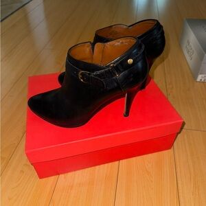 Ivanka Trump - black leather heeled booties. Size 8